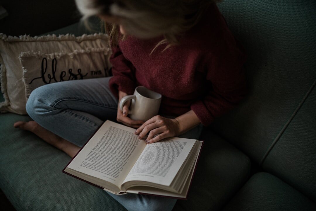 person reading mystery book